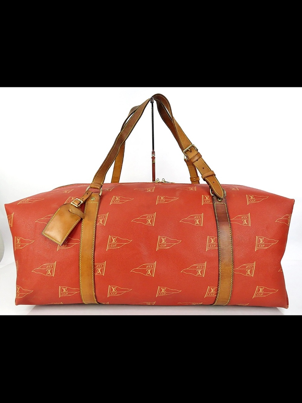 Louis Vuitton Red Duffel Bag with Tan Leather Straps